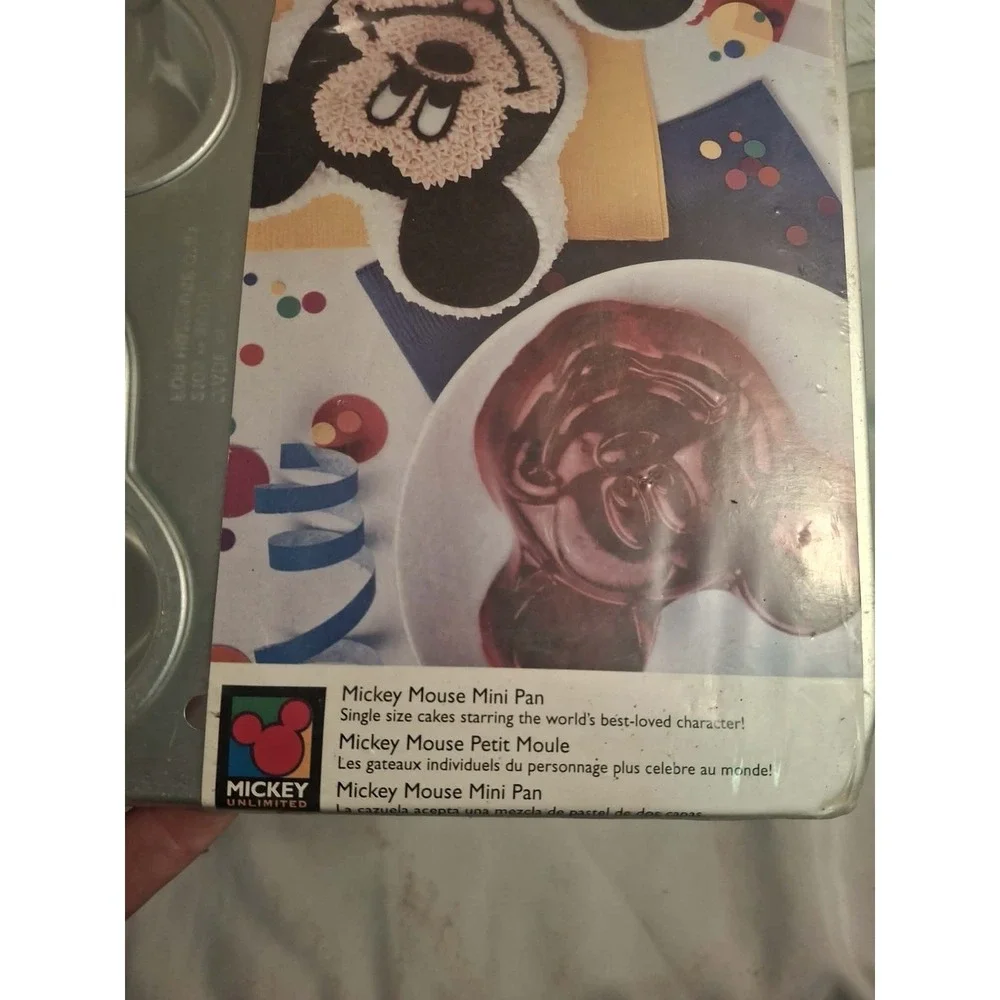 Mickey Mouse Mini Pan For Cakes. New . In Factory Seal. 6 shapes on pan.